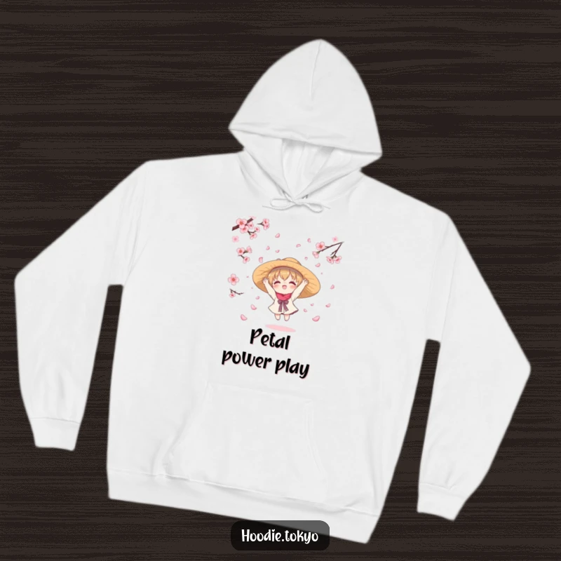 Funny hoodie depicting a cute kawaii character in a hat, hilariously trying to gather falling cherry blossom petals, radiating warmth and playful spring energy.